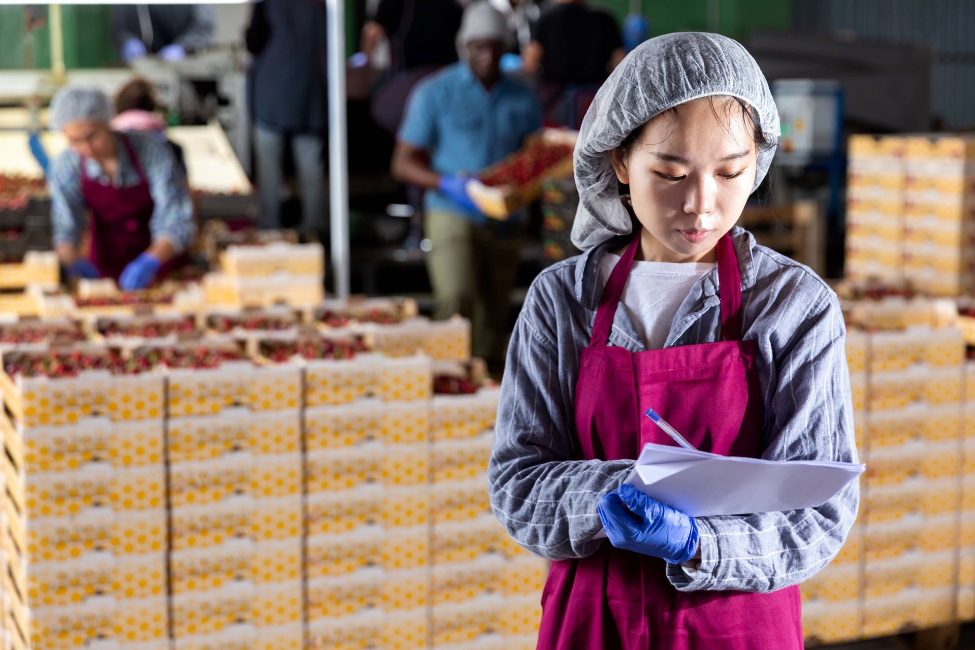 Image of a certification body auditor inspecting a fruit warehouse