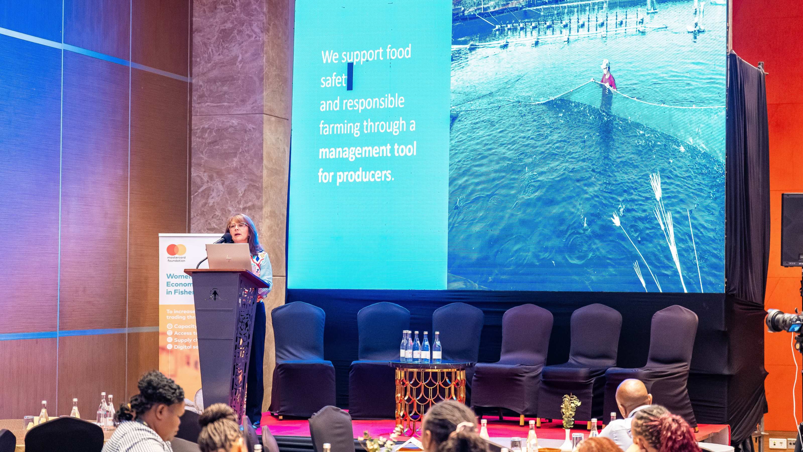 Valeska Weymann, Senior Technical Expert at Agraya, presents on the topic of aquaculture at the 2025 GLOBALG.A.P. TOUR stop in Nairobi, Kenya.