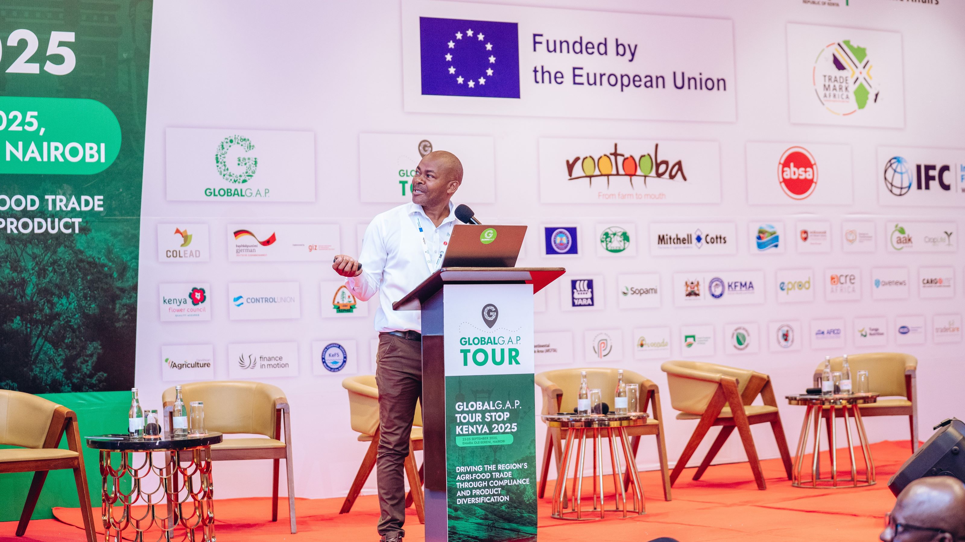 Mahinda Wahome, Technical Lead East Africa and Asia at Agraya GmbH, speaks on stage at the 2025 TOUR stop in Nairobi, Kenya.