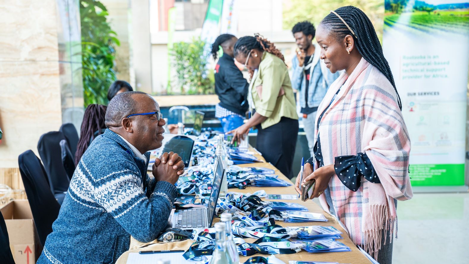 Participants of the 2025 GLOBALG.A.P. TOUR stop in Kenya check in to the event.