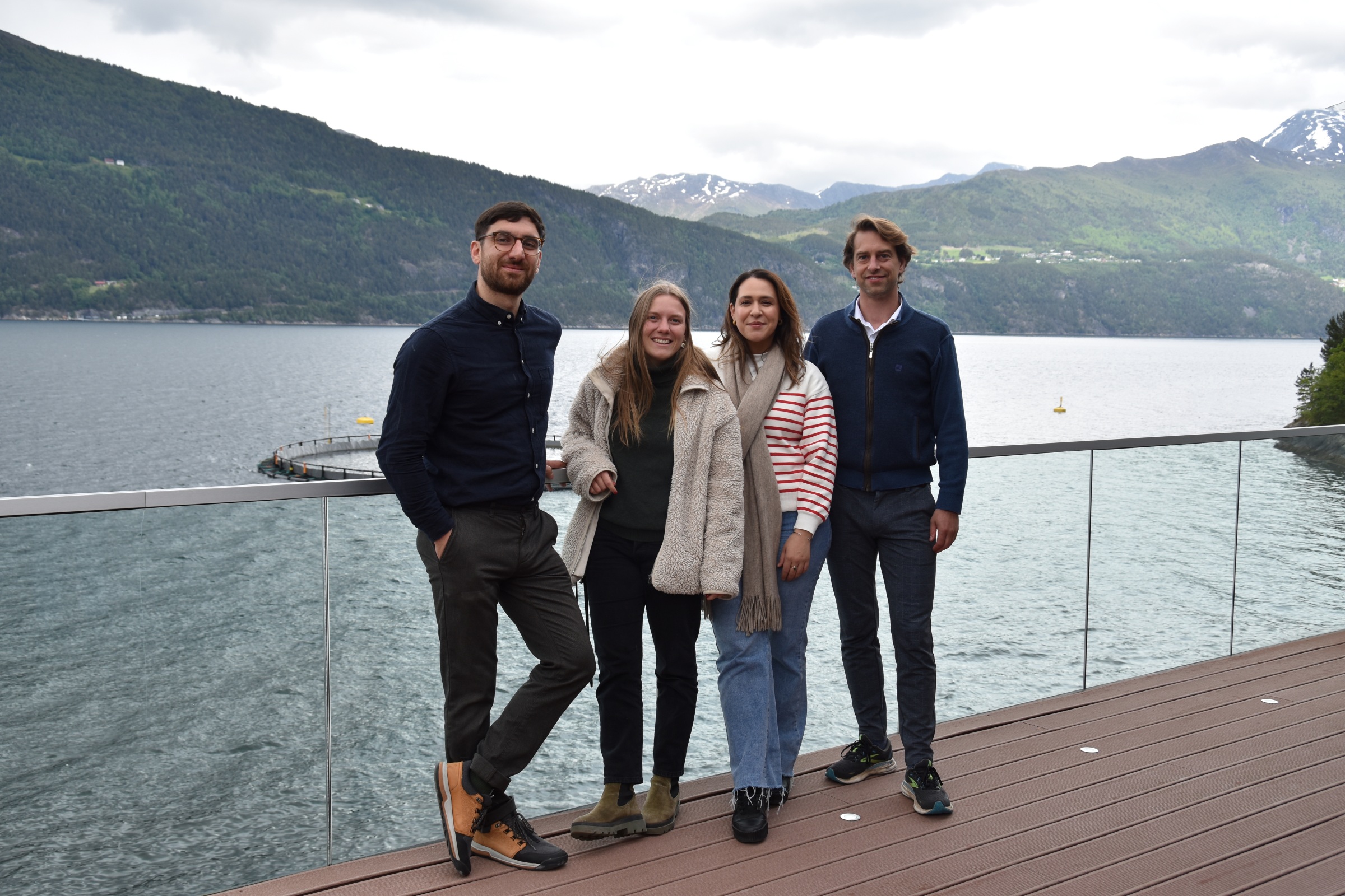 GLOBALG.A.P. representatives in pose by the water in Norway 2025, on a farm visit to Hofseth International to explore responsible aquaculture operations.
